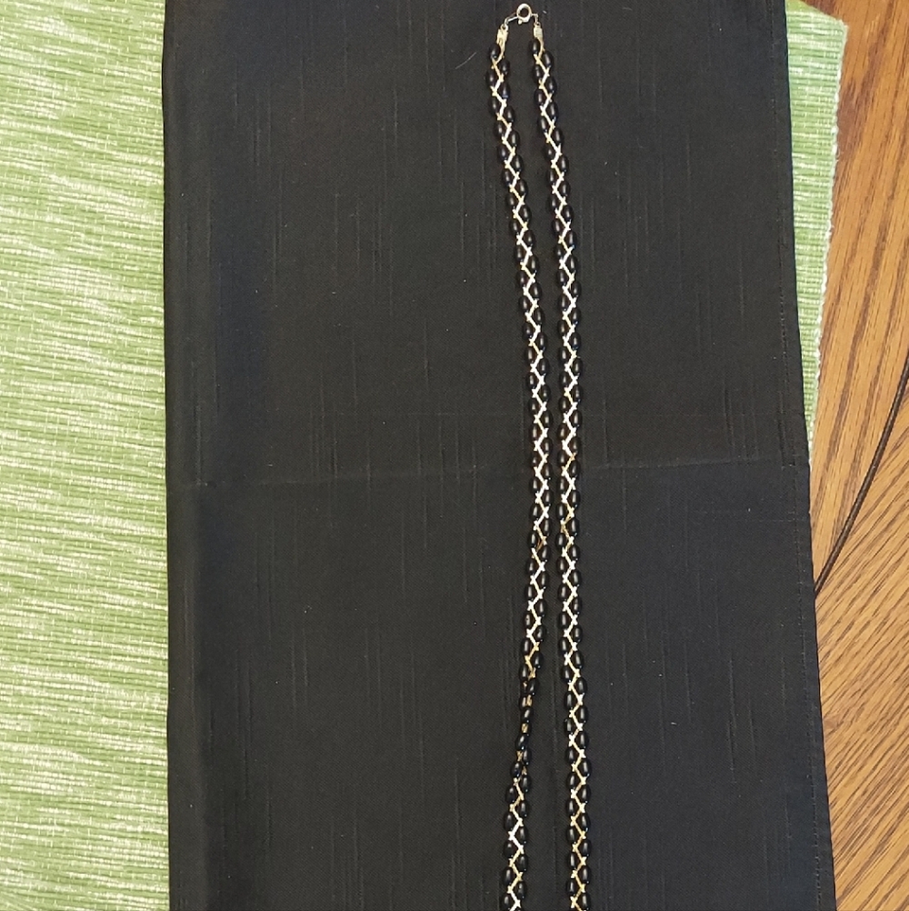 Elegant Gold and Black Necklace